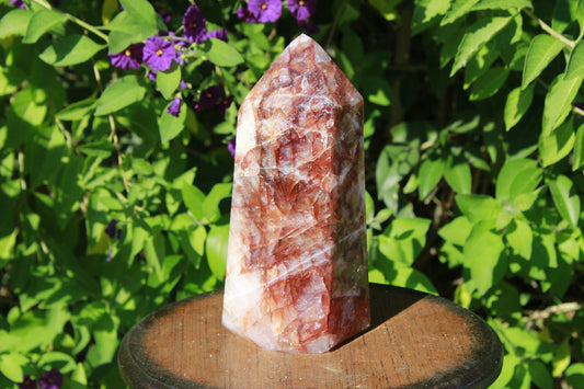 Hematoid Quartz promotes relaxation; works with the root chakra