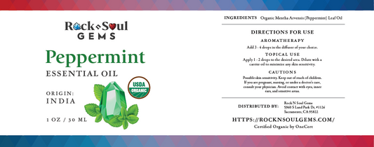 Premium amber bottle of Certified USDA Organic Peppermint Essential Oil displayed with fresh green peppermint leaves and USDA Organic certification badge in a bright botanical wellness setting