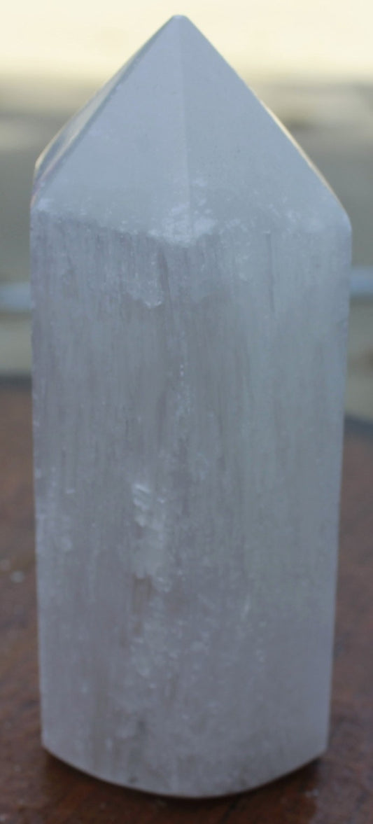 Selenite Obelisk will cleanse and charge other crystals