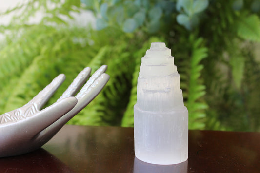 Selenite Pagoda Tower; use for meditation and activates the crown chakra