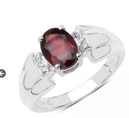 oval cut garnet with white topaz and silver ring; January birthstone jewelry