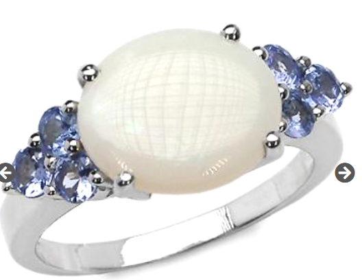 Opal October birthstone ring; recognized for rich healing properties