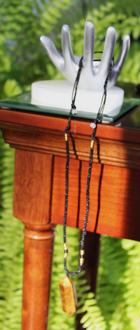 Tiger's Eye crystal jewelry; known to promote self-esteem