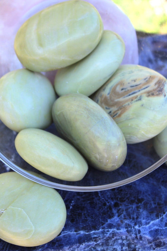 add Serpentine palm stone for a plethora of self-care aid support