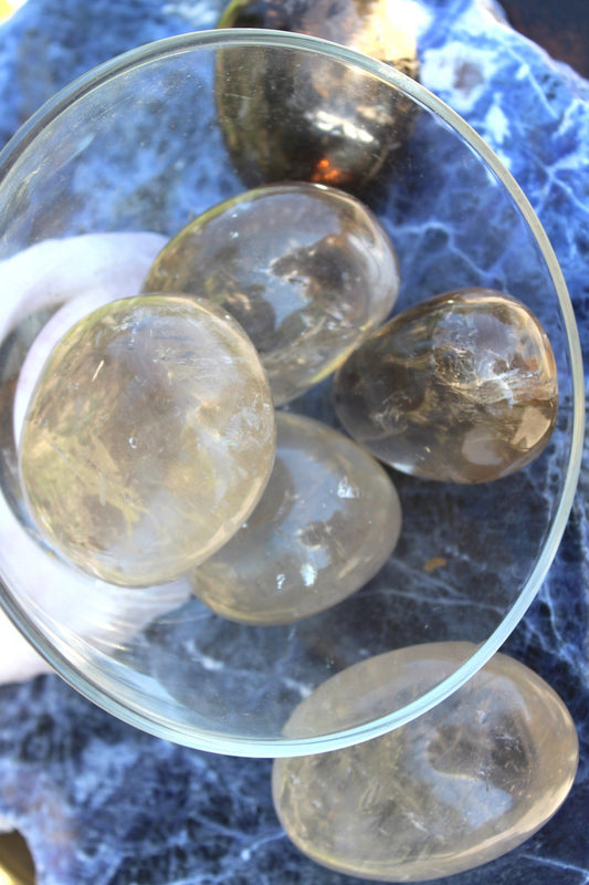 Smoky Quartz palm stone said to aid with depression and self-healing