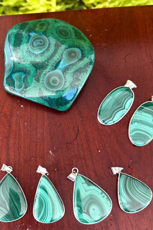 malachite and sterling silver; said to promote quick healing of injuries and support immune system